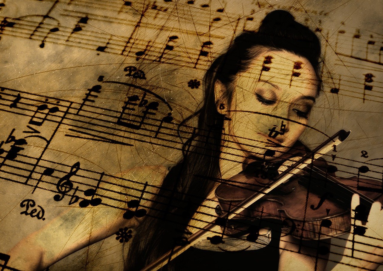 Noten und Frau mit Violine